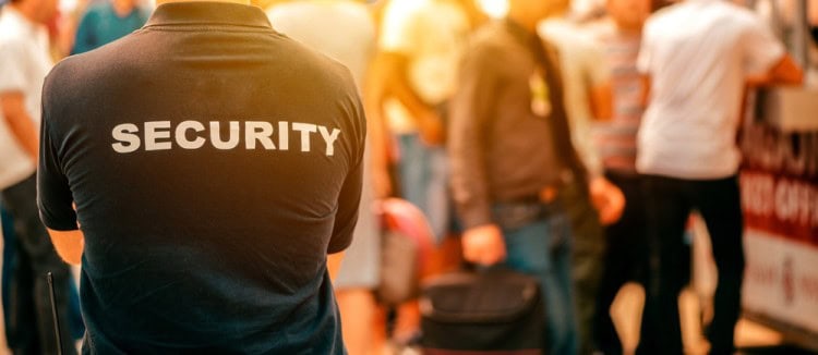 Security Guard Giving Security In Retail Store